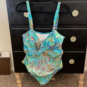 Very beautiful bathing suit says size us 22 but fits more like an xl